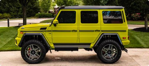 Yellow Mercedes-Benz G550 4x42