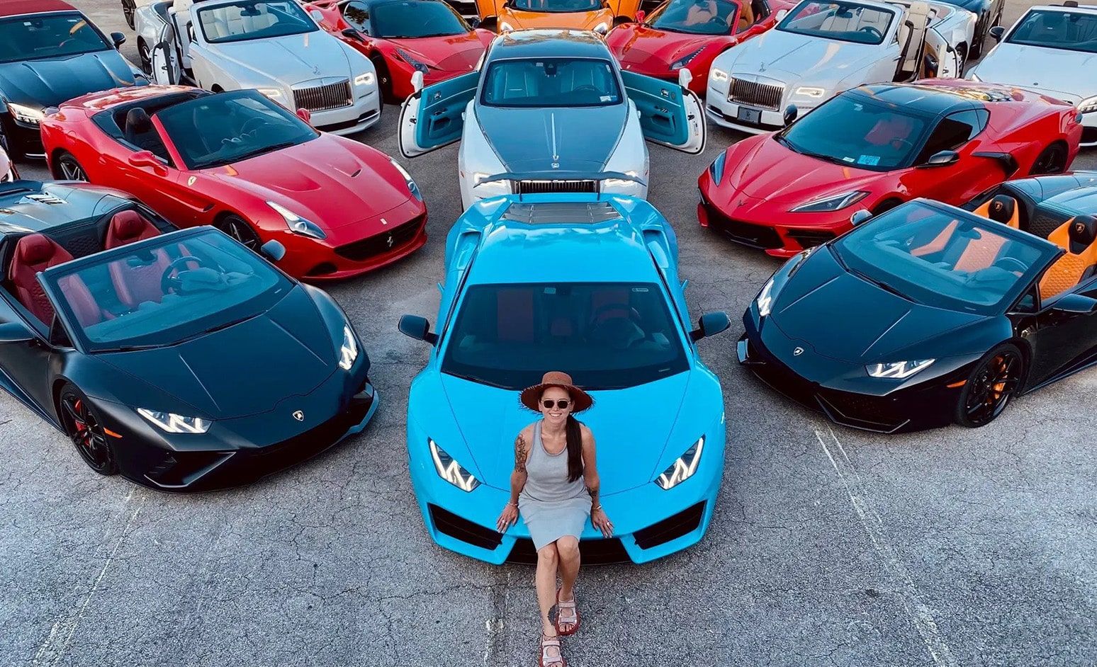Turo car sharing entrepreneurs standing in front of rental car fleet