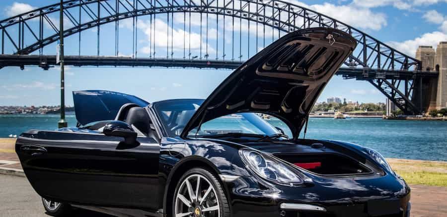 Convertible hire car on Turo, pictured in front of the Sydney Harbour Bridge