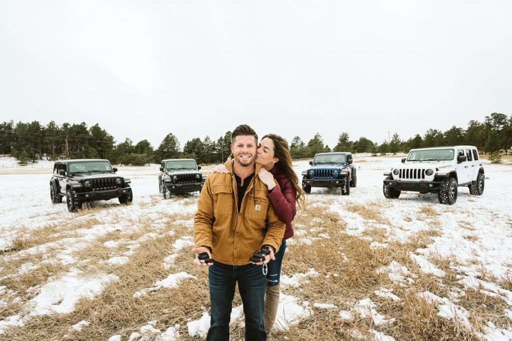 Justin and Meagan with their Jeep fleet in Denver