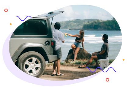 Group of friends with SUV rented of Turo on Hawaiian coast 