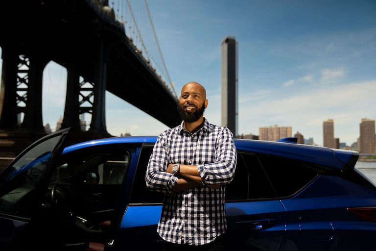 Turo host in New York in front of car
